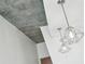 Modern loft with exposed concrete ceilings and contemporary pendant lighting at 860 Peachtree Ne St # 1008, Atlanta, GA 30308