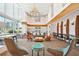 Elegant common area with stylish furniture, tables, and ample seating near floor to ceiling windows at 860 Peachtree Ne St # 1008, Atlanta, GA 30308