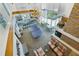 Bright common area with ping pong, fireplace, kitchen, seating and floor to ceiling windows at 860 Peachtree Ne St # 1008, Atlanta, GA 30308