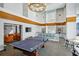 Community game room featuring a ping pong table, kitchenette, and high ceilings at 860 Peachtree Ne St # 1008, Atlanta, GA 30308