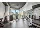 Well-equipped gym with modern weight machines and city views at 860 Peachtree Ne St # 1008, Atlanta, GA 30308