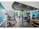 State-of-the-art gym with modern equipment, mirrors, and city views at 860 Peachtree Ne St # 1008, Atlanta, GA 30308