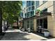 Modern restaurant exterior with large windows and street side greenery at 860 Peachtree Ne St # 1008, Atlanta, GA 30308