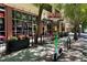 Exterior shot of The Vortex bar with outdoor seating at 860 Peachtree Ne St # 1008, Atlanta, GA 30308