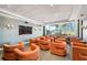Cozy in-building theater room with comfortable seating and a large viewing screen at 860 Peachtree Ne St # 1008, Atlanta, GA 30308