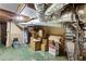 Unfinished basement, offering a blank canvas with visible ductwork and water heater at 1721 Clifton Se Way, Atlanta, GA 30316