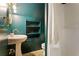 Stylish bathroom with a pedestal sink, tiled floor, and a shower stall at 1721 Clifton Se Way, Atlanta, GA 30316