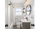 Stylish bathroom features a modern vanity, patterned tile floor, and shower/tub combo at 1721 Clifton Se Way, Atlanta, GA 30316