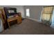 Bedroom featuring carpet, neutral walls, one window, and a desk at 3124 Usher Nw St, Covington, GA 30014