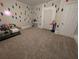 Bedroom with carpet, neutral walls, and a door to the hallway at 3124 Usher Nw St, Covington, GA 30014