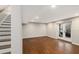 Finished basement featuring wood look floors and walk out to backyard at 185 Nickajack Se Rd, Mableton, GA 30126