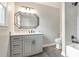 Modern bathroom featuring a vanity with granite countertop and a tub with shower at 185 Nickajack Se Rd, Mableton, GA 30126