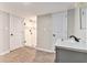 Bathroom featuring a glass enclosed shower, white tile and vanity at 185 Nickajack Se Rd, Mableton, GA 30126