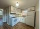 Well-lit kitchen equipped with modern appliances, sleek countertops, and lots of cabinet space at 185 Nickajack Se Rd, Mableton, GA 30126