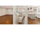Open layout shows updated kitchen with an island and stainless appliances at 185 Nickajack Se Rd, Mableton, GA 30126