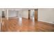 Spacious living room featuring hardwood floors and stylish barn doors at 185 Nickajack Se Rd, Mableton, GA 30126