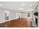 Spacious living room featuring hardwood floors, fireplace and natural light at 185 Nickajack Se Rd, Mableton, GA 30126