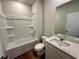 Bright bathroom showcasing a shower-tub combo and a single sink vanity at 2371 Brown Dove Way Lot 4, Grayson, GA 30017