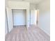 Bedroom showcasing closet with doors open at 2371 Brown Dove Way Lot 4, Grayson, GA 30017
