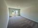 Neutral carpeted bedroom with natural light from double windows at 2371 Brown Dove Way Lot 4, Grayson, GA 30017
