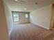 Cozy bedroom with neutral carpet and sunlit windows at 2371 Brown Dove Way Lot 4, Grayson, GA 30017