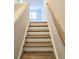 Staircase with wood treads and white risers at 2371 Brown Dove Way Lot 4, Grayson, GA 30017