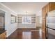 Dining room features hardwood floors and shelving near a large window at 501 Powder Mill St, Dallas, GA 30157