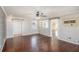 Spacious living room with hardwood floors, neutral paint, and recessed lighting at 501 Powder Mill St, Dallas, GA 30157