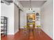 Dining area featuring a small bar table, stools, and open access to the kitchen at 806 Marcus Se St # 21, Atlanta, GA 30316