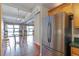Kitchen is visible from living room and features stainless steel appliances and wooden cabinets at 806 Marcus Se St # 21, Atlanta, GA 30316