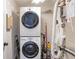 Convenient laundry room with stacked washer and dryer and efficient storage solutions at 806 Marcus Se St # 21, Atlanta, GA 30316