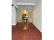 Open-concept living room with industrial lighting and connected kitchenette at 806 Marcus Se St # 21, Atlanta, GA 30316