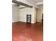 Spacious living room featuring industrial ceiling elements and shelving at 806 Marcus Se St # 21, Atlanta, GA 30316