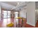 Open living space with polished floors, bar seating, and ample natural light from large windows at 806 Marcus Se St # 21, Atlanta, GA 30316