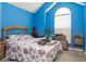 Bright bedroom with a large window, a full-size bed, and colorful bedding at 11 Montclair Ct, Cartersville, GA 30121