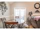 Charming dining area adjacent to the living room, perfect for casual meals and gatherings at 11 Montclair Ct, Cartersville, GA 30121