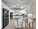 Modern kitchen with white cabinets, granite countertops, and stainless steel appliances at 1865 Berkeley Mews Ne, Atlanta, GA 30329