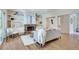 Bright living room featuring a stone fireplace, built-in shelves, and hardwood floors at 1865 Berkeley Mews Ne, Atlanta, GA 30329