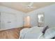 A bright main bedroom boasts hardwood floors and neutral decor at 1865 Berkeley Mews Ne, Atlanta, GA 30329