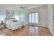 Spacious main bedroom features hardwood floors, large windows, and elegant decor at 1865 Berkeley Mews Ne, Atlanta, GA 30329