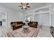 Spacious living room with high ceilings, hardwood floors, natural light and an open layout at 2860 Chardonnay Ln, Cumming, GA 30041