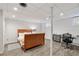 Cozy basement bedroom with wooden-look flooring, recessed lighting, and neutral decor. A comfortable bed makes it inviting at 3154 Chamblee Tucker Rd, Atlanta, GA 30341