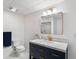 Bathroom with modern vanity with a marble countertop and modern toilet at 3154 Chamblee Tucker Rd, Atlanta, GA 30341