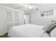 Bedroom with white walls, carpet, a ceiling fan, and plenty of light at 3154 Chamblee Tucker Rd, Atlanta, GA 30341