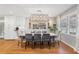 Elegant dining room with a modern chandelier and views of the updated kitchen at 3154 Chamblee Tucker Rd, Atlanta, GA 30341