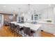 Kitchen with an island, white cabinets, and stainless steel appliances at 3154 Chamblee Tucker Rd, Atlanta, GA 30341