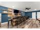 Stylish bar area with custom shelving, perfect for entertaining guests at 6124 Locklear Way, Douglasville, GA 30134