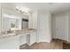 Spacious bathroom featuring double sink vanity and white cabinetry at 6124 Locklear Way, Douglasville, GA 30134