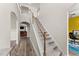 Bright foyer with staircase and wood floors at 6124 Locklear Way, Douglasville, GA 30134