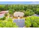 Aerial view of community amenities: pool, clubhouse, tennis courts, and parking at 2678 Neighborhood S Walk, Villa Rica, GA 30180